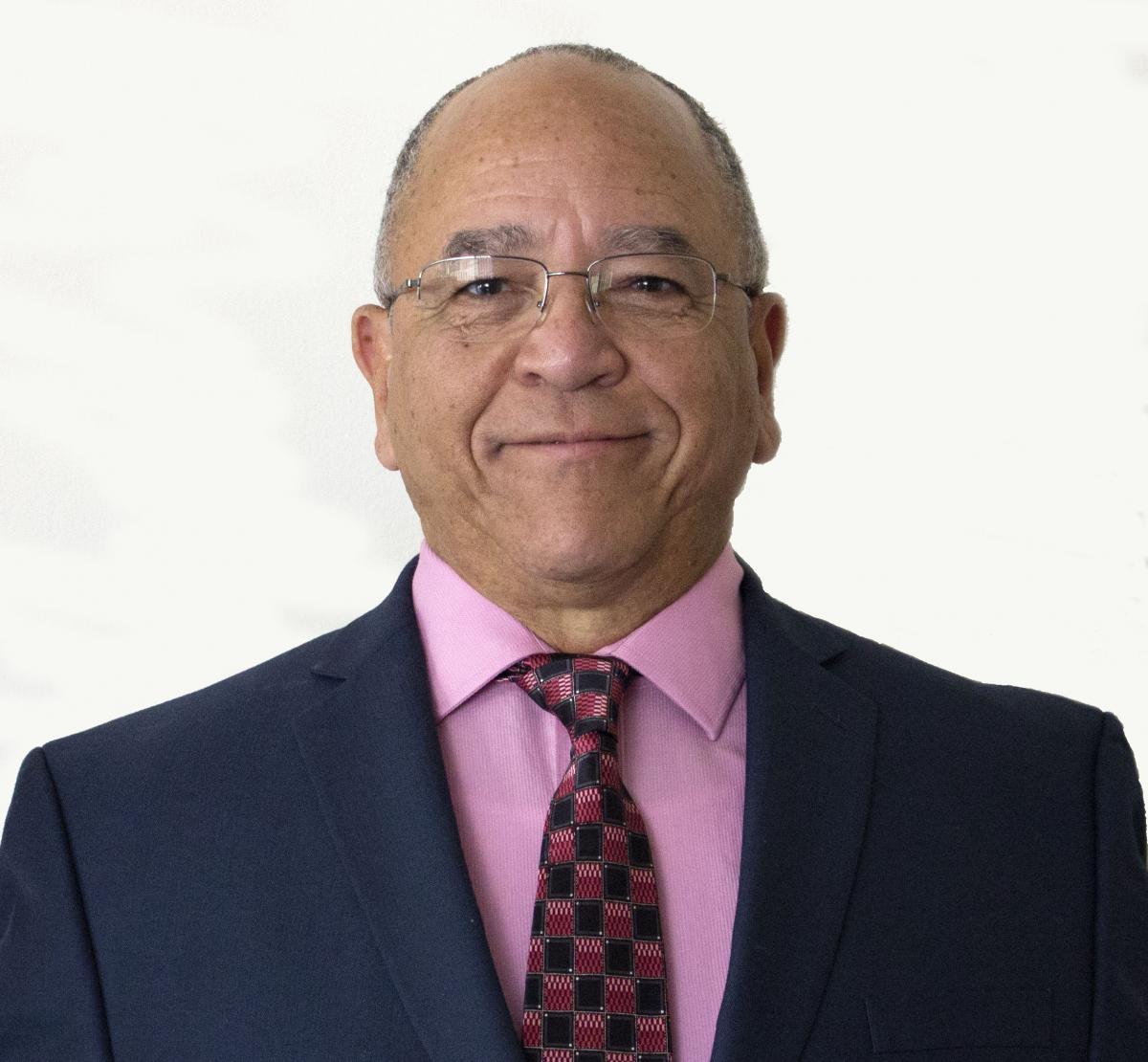 Dr. Orlando E. Raola